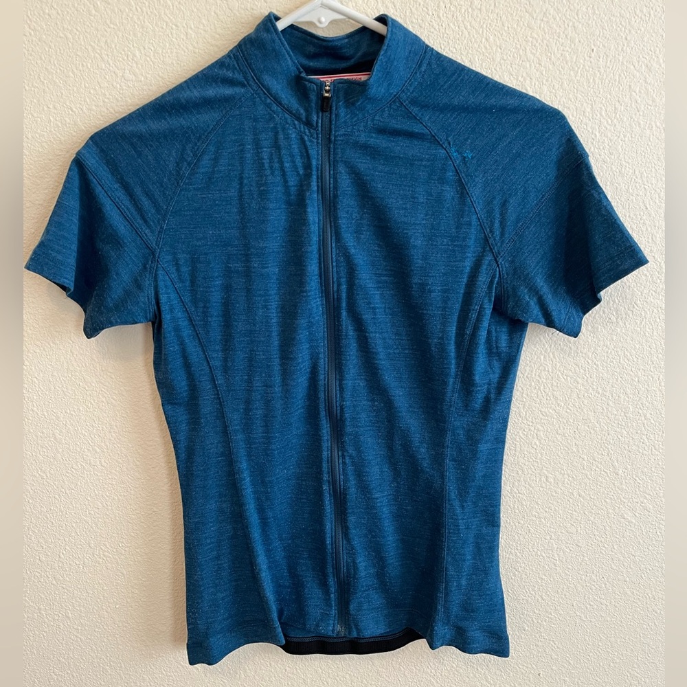 Women’s Giro blue wool short sleeve cycling jersey, size Small.